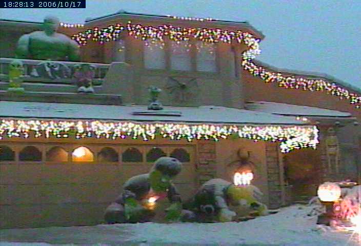 snow piles up on inflatables