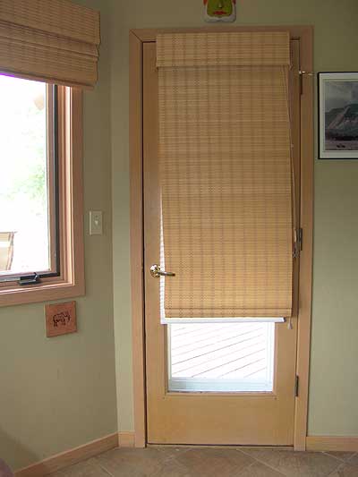 brass door blinds on